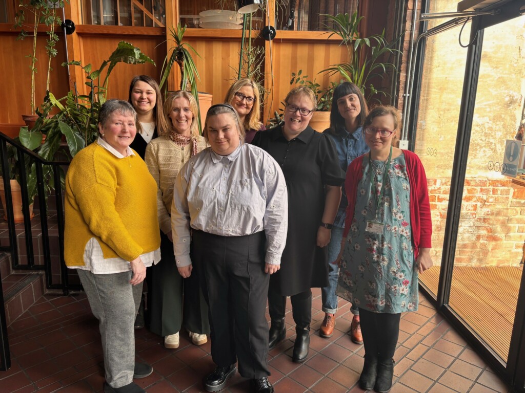 7 of the project partners and people with lived experience celebrate the launch of the cervical cancer screening films